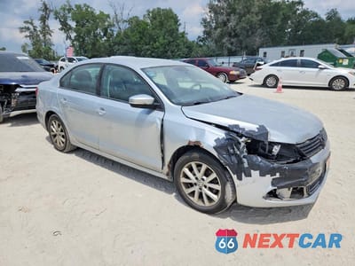 Czwarte zdjęcie samochodu z boku: 2011 VOLKSWAGEN JETTA SE VIN:3VWDZ7AJ2BM361458 - miniatura