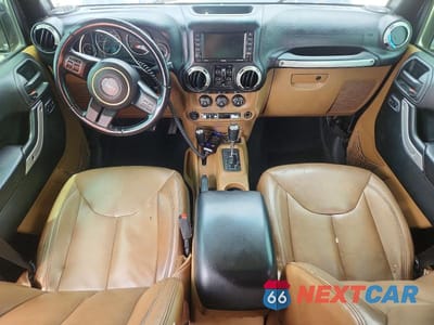 Zdjęcie 8 z 12 samochodu: 2017 JEEP WRANGLER UNLIMITED SAHARA VIN:1C4BJWEG3HL696314 - miniatura