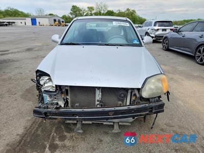 Piąte zdjęcie samochodu w środku: 2005 HYUNDAI ACCENT GS VIN:KMHCG35C45U350630 - miniatura