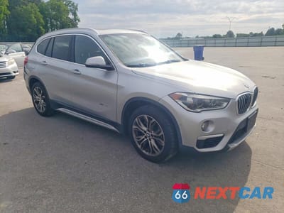 Czwarte zdjęcie samochodu z boku: 2017 BMW X1 XDRIVE28I VIN:WBXHT3C30H5F83434 - miniatura