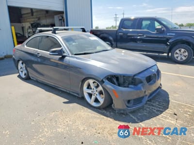 Czwarte zdjęcie samochodu z boku: 2015 BMW 228 I SULEV VIN:WBA1F9C5XFVW98429 - miniatura
