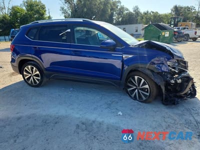 Czwarte zdjęcie samochodu z boku: 2023 VOLKSWAGEN TAOS SE VIN:3VVEX7B26PM349925 - miniatura