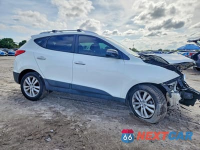 Czwarte zdjęcie samochodu z boku: 2012 HYUNDAI TUCSON LIMITED VIN:KM8JU3AC1CU524947 - miniatura