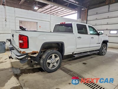 Trzecie zdjęcie samochodu z tyłu: 2016 GMC SIERRA K2500 SLT VIN:1GT12TE82GF162900 - miniatura