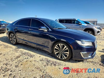 Czwarte zdjęcie samochodu z boku: 2017 LINCOLN MKZ RESERVE VIN:3LN6L5F90HR659689 - miniatura