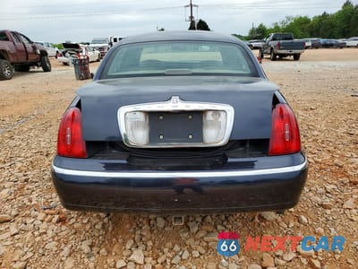 Zdjęcie 6 z 12 samochodu: 1999 LINCOLN TOWN CAR EXECUTIVE VIN:1LNHM81W4XY665208 - miniatura