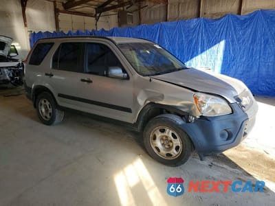Czwarte zdjęcie samochodu z boku: 2006 HONDA CR-V LX VIN:JHLRD78516C037024 - miniatura