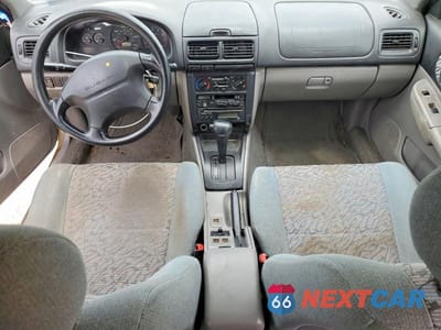 Zdjęcie 8 z 12 samochodu: 1998 SUBARU IMPREZA OUTBACK VIN:JF1GF4851WH813478 - miniatura