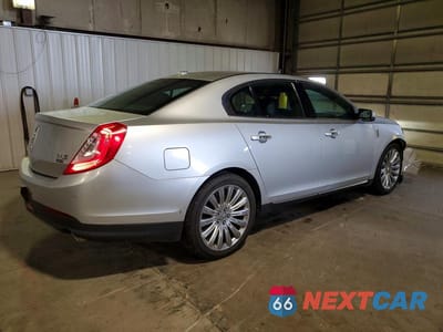 Trzecie zdjęcie samochodu z tyłu: 2014 LINCOLN MKS VIN:1LNHL9EK4EG600295 - miniatura