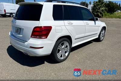 Czwarte zdjęcie samochodu z boku: 2015 MERCEDES-BENZ GLK 350 VIN:WDCGG5HB7FG427943 - miniatura