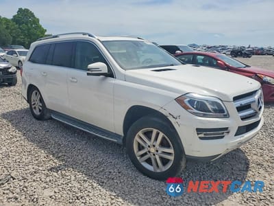 Czwarte zdjęcie samochodu z boku: 2014 MERCEDES-BENZ GL 450 4MATIC VIN:4JGDF7CE6EA418351 - miniatura