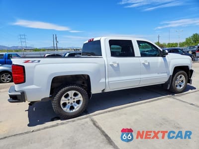 Trzecie zdjęcie samochodu z tyłu: 2017 CHEVROLET SILVERADO K1500 LT VIN:3GCUKREC6HG431016 - miniatura