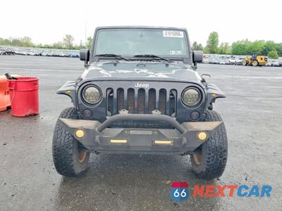 Piąte zdjęcie samochodu w środku: 2010 JEEP WRANGLER UNLIMITED SAHARA VIN:1J4BA5H19AL162283 - miniatura