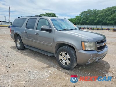 Czwarte zdjęcie samochodu z boku: 2007 CHEVROLET SUBURBAN C1500 VIN:1GNFC16037J216712 - miniatura