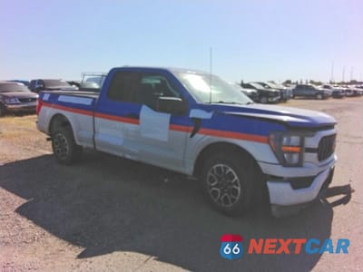 Czwarte zdjęcie samochodu z boku: 2023 FORD F150 SUPER CAB VIN:1FTEX1CP6PKD00401 - miniatura