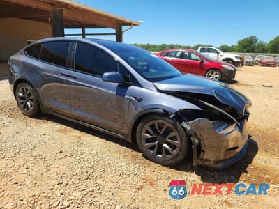 Czwarte zdjęcie samochodu z boku: 2022 TESLA MODEL X VIN:7SAXCAE52NF341119 - miniatura