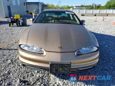 Piąte zdjęcie samochodu w środku: 1998 OLDSMOBILE AURORA VIN:1G3GR62C5W4106251 - miniatura