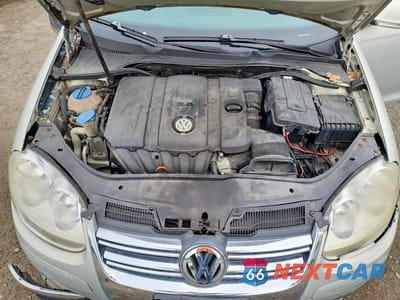 Zdjęcie 11 z 12 samochodu: 2010 VOLKSWAGEN JETTA SE VIN:3VWRZ7AJ0AM033766 - miniatura