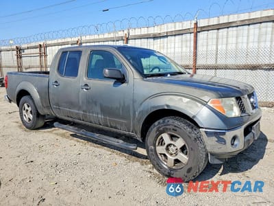 Czwarte zdjęcie samochodu z boku: 2007 NISSAN FRONTIER SE VIN:1N6AD09U07C452230 - miniatura