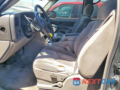Zdjęcie 7 z 14 samochodu: 2003 CHEVROLET TAHOE C1500 VIN:1GNEC13ZX3J274129 - miniatura