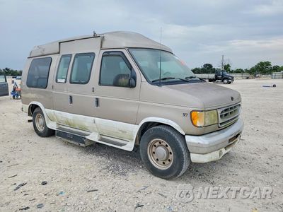 Czwarte zdjęcie samochodu z boku: 2004 FORD E250 E250 VIN:1FDPE24L72HA94331 - miniatura