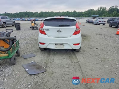 Zdjęcie 6 z 12 samochodu: 2014 HYUNDAI ACCENT SE VIN:KMHCU5AE7EU183630 - miniatura