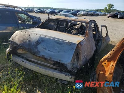 Trzecie zdjęcie samochodu z tyłu: 2006 CADILLAC DTS VIN:1G6KD57Y46U105005 - miniatura