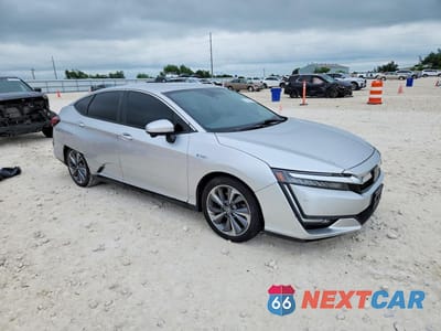 Czwarte zdjęcie samochodu z boku: 2018 HONDA CLARITY TOURING VIN:JHMZC5F39JC001319 - miniatura