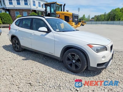 Czwarte zdjęcie samochodu z boku: 2013 BMW X1 XDRIVE28I VIN:WBAVL1C59DVR86337 - miniatura