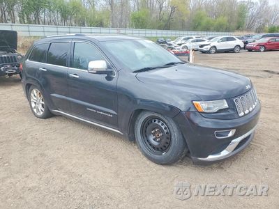Czwarte zdjęcie samochodu z boku: 2014 JEEP GRAND CHEROKEE SUMMIT VIN:1C4RJFJG2EC338749 - miniatura