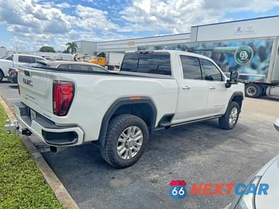 Czwarte zdjęcie samochodu z boku: 2023 GMC SIERRA K2500 DENALI VIN:1GT49REYXPF142843 - miniatura