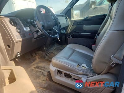 Zdjęcie 7 z 12 samochodu: 2010 FORD F150 VIN:1FTMF1CW6AKA46539 - miniatura