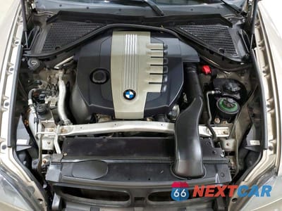 Zdjęcie 12 z 13 samochodu: 2010 BMW X5 XDRIVE35D VIN:5UXFF0C53ALJ99754 - miniatura