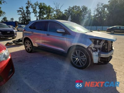 Czwarte zdjęcie samochodu z boku: 2020 FORD EDGE TITANIUM VIN:2FMPK4K95LBB31449 - miniatura