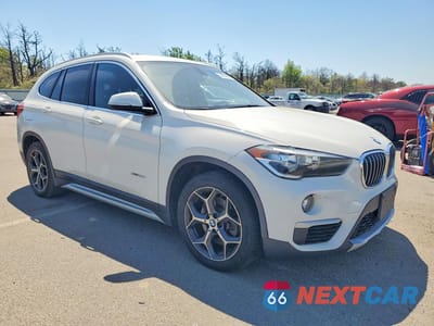 Czwarte zdjęcie samochodu z boku: 2016 BMW X1 XDRIVE28I VIN:WBXHT3C34GP889715 - miniatura