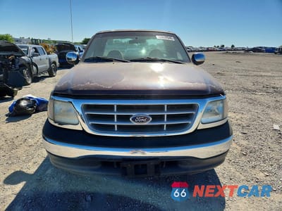 Piąte zdjęcie samochodu w środku: 2000 FORD F150 VIN:1FTZF1721YNA94617 - miniatura