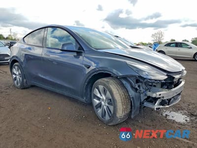Czwarte zdjęcie samochodu z boku: 2023 TESLA MODEL Y VIN:7SAYGDEE3PF843165 - miniatura
