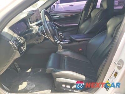Zdjęcie 7 z 12 samochodu: 2021 BMW M5 VIN:WBS83CH00MCF82410 - miniatura