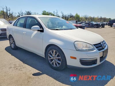 Czwarte zdjęcie samochodu z boku: 2010 VOLKSWAGEN JETTA SE VIN:3VWRZ7AJ0AM123953 - miniatura