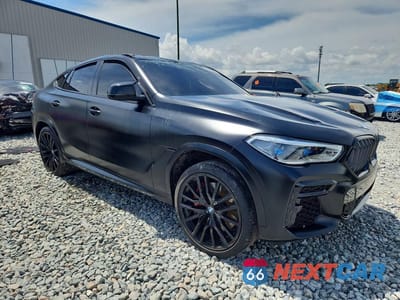 Czwarte zdjęcie samochodu z boku: 2022 BMW X6 M50I VIN:5UXCY8C02N9K45397 - miniatura