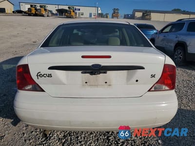 Zdjęcie 6 z 13 samochodu: 2004 FORD FOCUS SE COMFORT VIN:1FAFP34364W174742 - miniatura