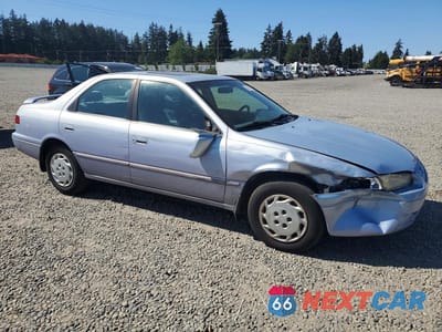 Czwarte zdjęcie samochodu z boku: 1997 TOYOTA CAMRY LE VIN:JT2BG22KXV0055134 - miniatura