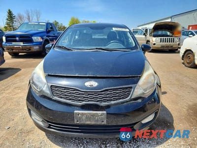 Piąte zdjęcie samochodu w środku: 2013 KIA RIO LX VIN:KNADM4A38D6207984 - miniatura