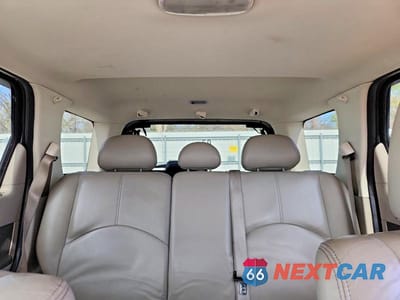 Zdjęcie 10 z 14 samochodu: 2009 MERCURY MARINER PREMIER VIN:4M2CU97G39KJ25756 - miniatura