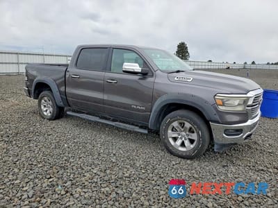 Czwarte zdjęcie samochodu z boku: 2019 RAM 1500 LARAMIE VIN:1C6SRFJT5KN725357 - miniatura