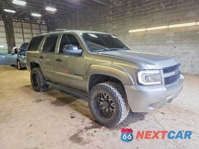 Czwarte zdjęcie samochodu z boku: 2007 CHEVROLET TAHOE K1500 VIN:1GNFK13097J320158 - miniatura