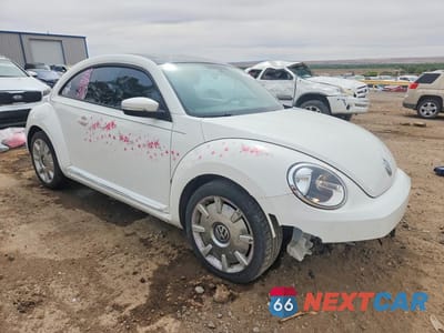 Czwarte zdjęcie samochodu z boku: 2013 VOLKSWAGEN BEETLE VIN:3VWJP7AT1DM605789 - miniatura