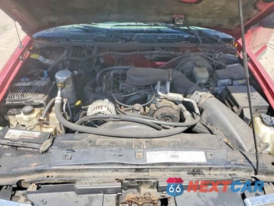 Zdjęcie 12 z 13 samochodu: 2000 CHEVROLET BLAZER VIN:1GNCS13W7Y2176970 - miniatura