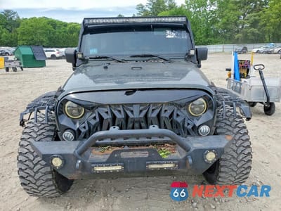 Piąte zdjęcie samochodu w środku: 2011 JEEP WRANGLER UNLIMITED SAHARA VIN:1J4BA5H15BL532579 - miniatura