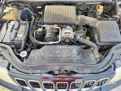 Zdjęcie 12 z 13 samochodu: 2002 JEEP GRAND CHEROKEE LIMITED VIN:1J8GW58N72C129163 - miniatura